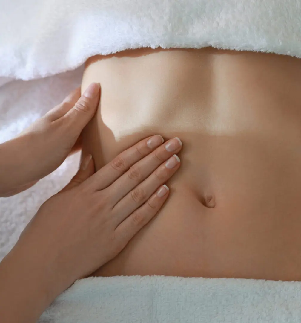 :Lymphatic massage treating abdomen area
