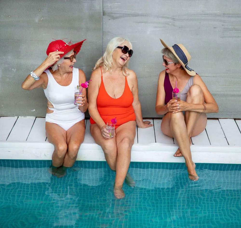3 woman around the pool share information about tailored treatment plan may involve specialized techniques to strengthen body
